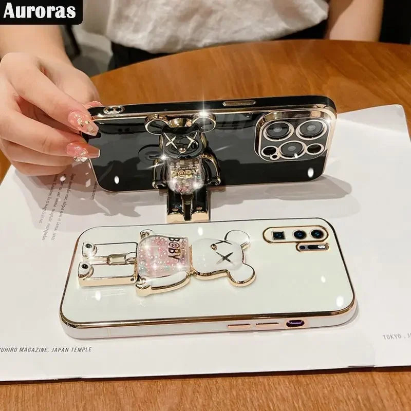 Luxus 3D Bärenhalterung Crossbody Armband mit Riemen & Lanyard iPhone Hülle | MagSafe Case mit Rundumschutz und Kameralinsenschutzabdeckung für Apple iPhone 17/17 Air, 16/16e, 15, 14, 13 Pro Max Plus Cover | Panzertasche Handyhülle | Premium Schutzhülle